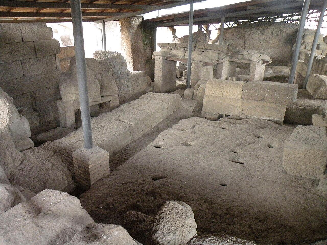 Post holes cut into the rock of the Palatine, where the huts of the earliest settlers stood